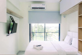 Studio with Cozy Design at Sky House BSD Apartment By Travelio